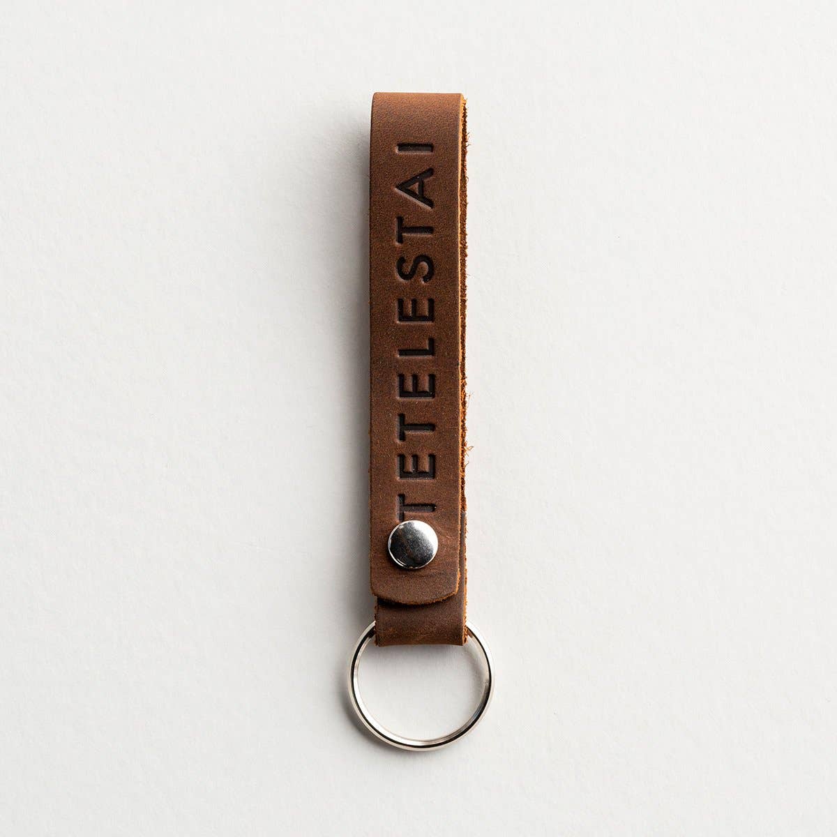 TETELESTAI Leather Keychain